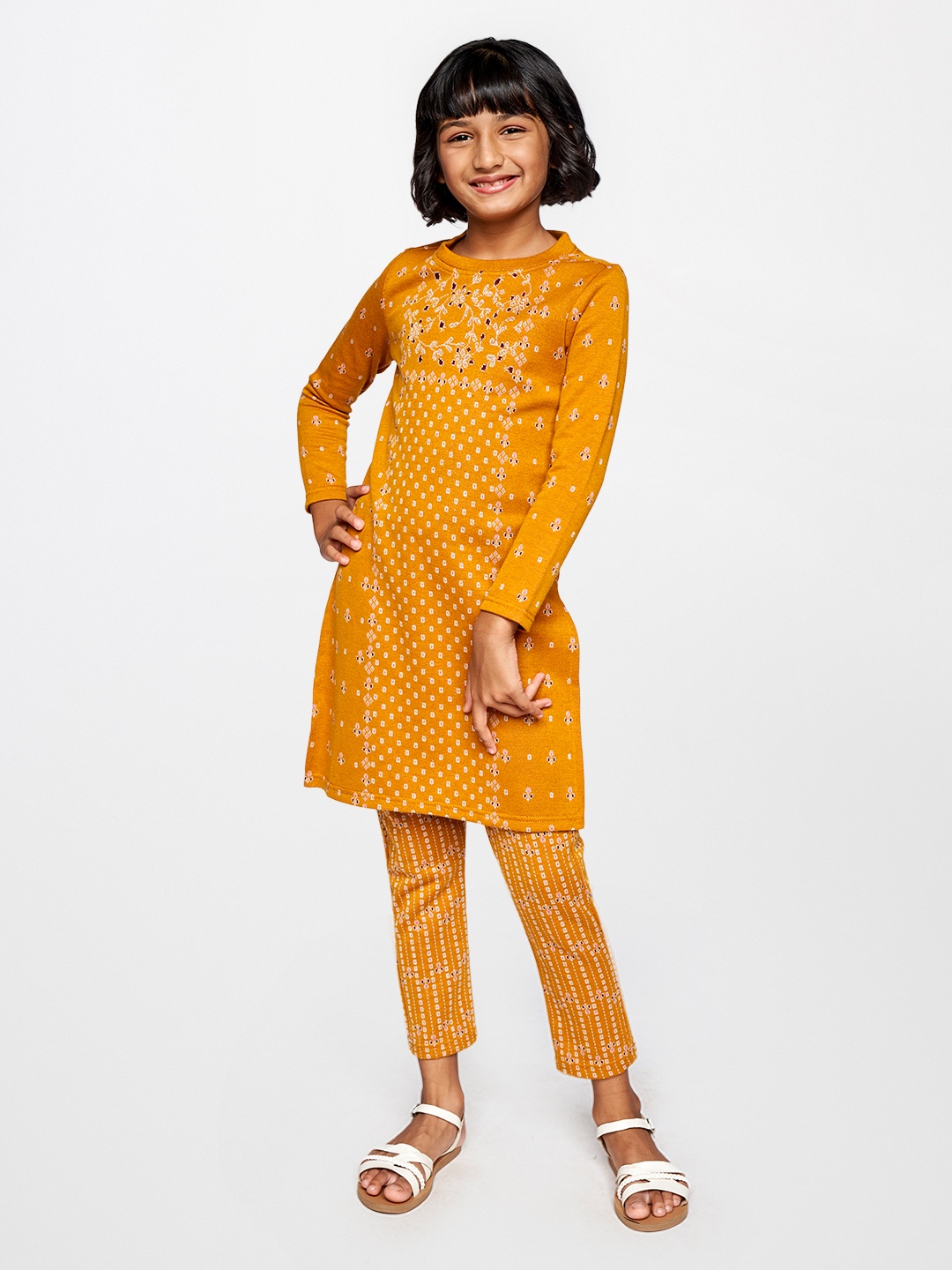 

Global Desi Girls Mustard Printed Trousers