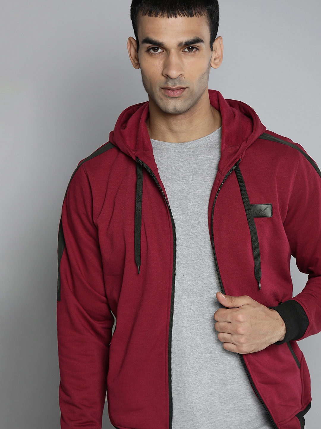 

HRX by Hrithik Roshan Men Maroon Solid Hooded Sweatshirt