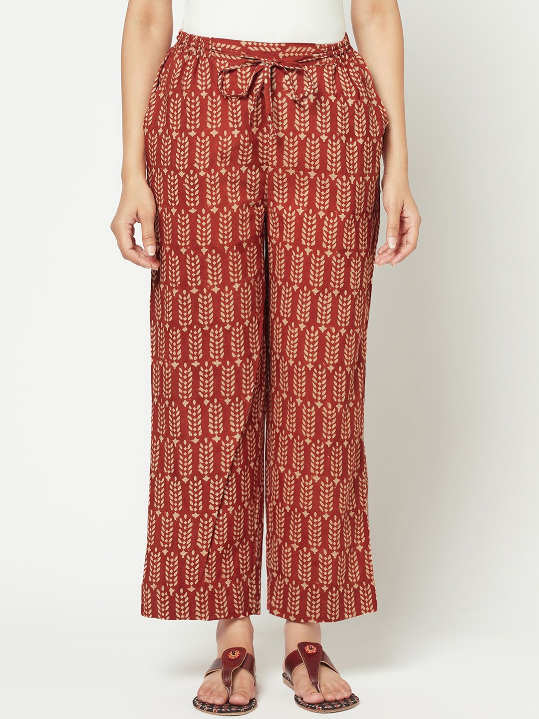 

Fabindia Women Rust Floral Printed Loose Fit Trousers