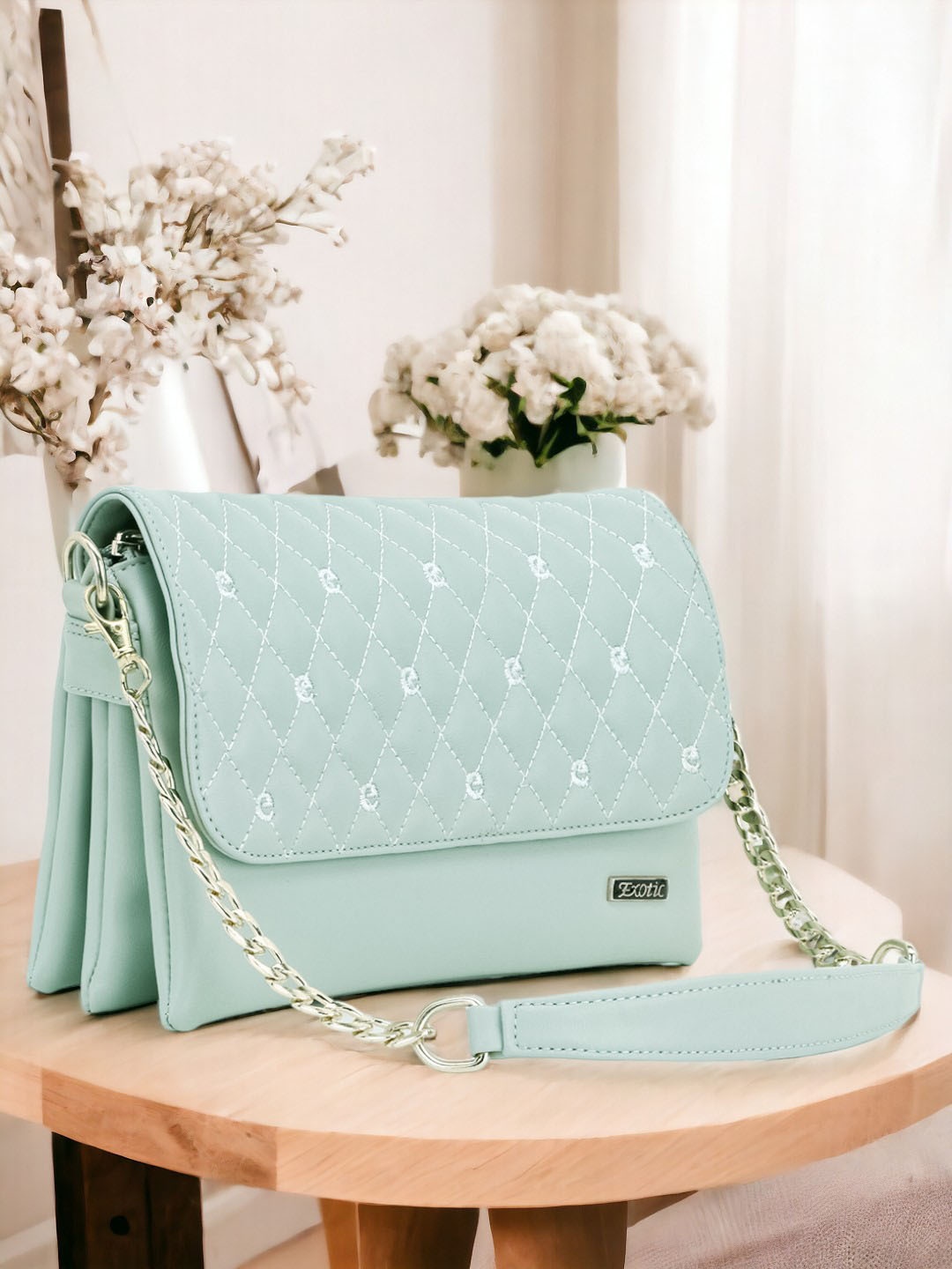 

Exotic Sea Green Textured Quilted Structured Sling Bag