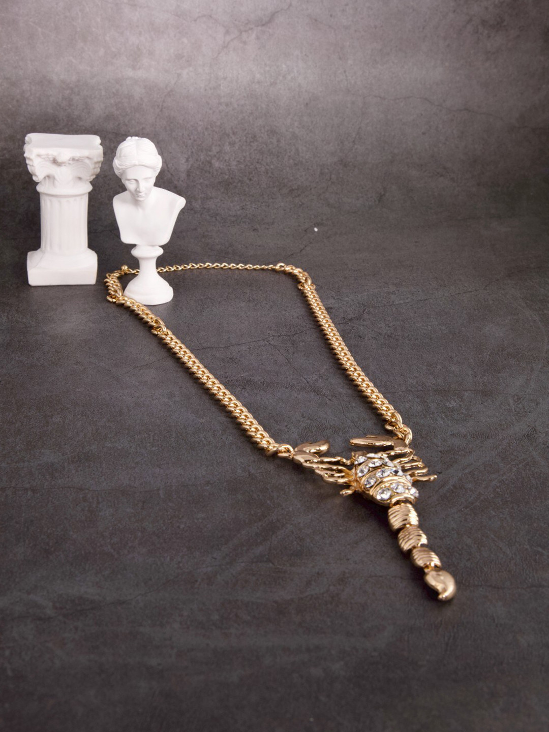 

anore Gold-Toned & White Cleopatra Diamond Studded Scorpion Statement Necklace