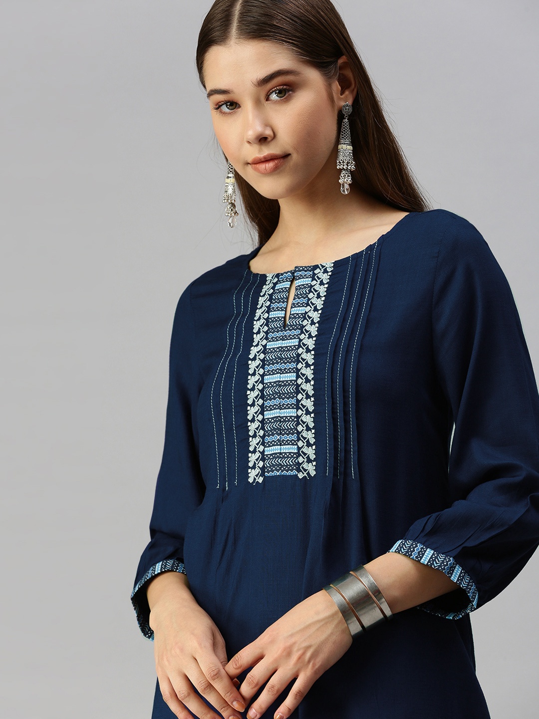 

Global Desi Women Blue Yoke Design Keyhole Neck Top