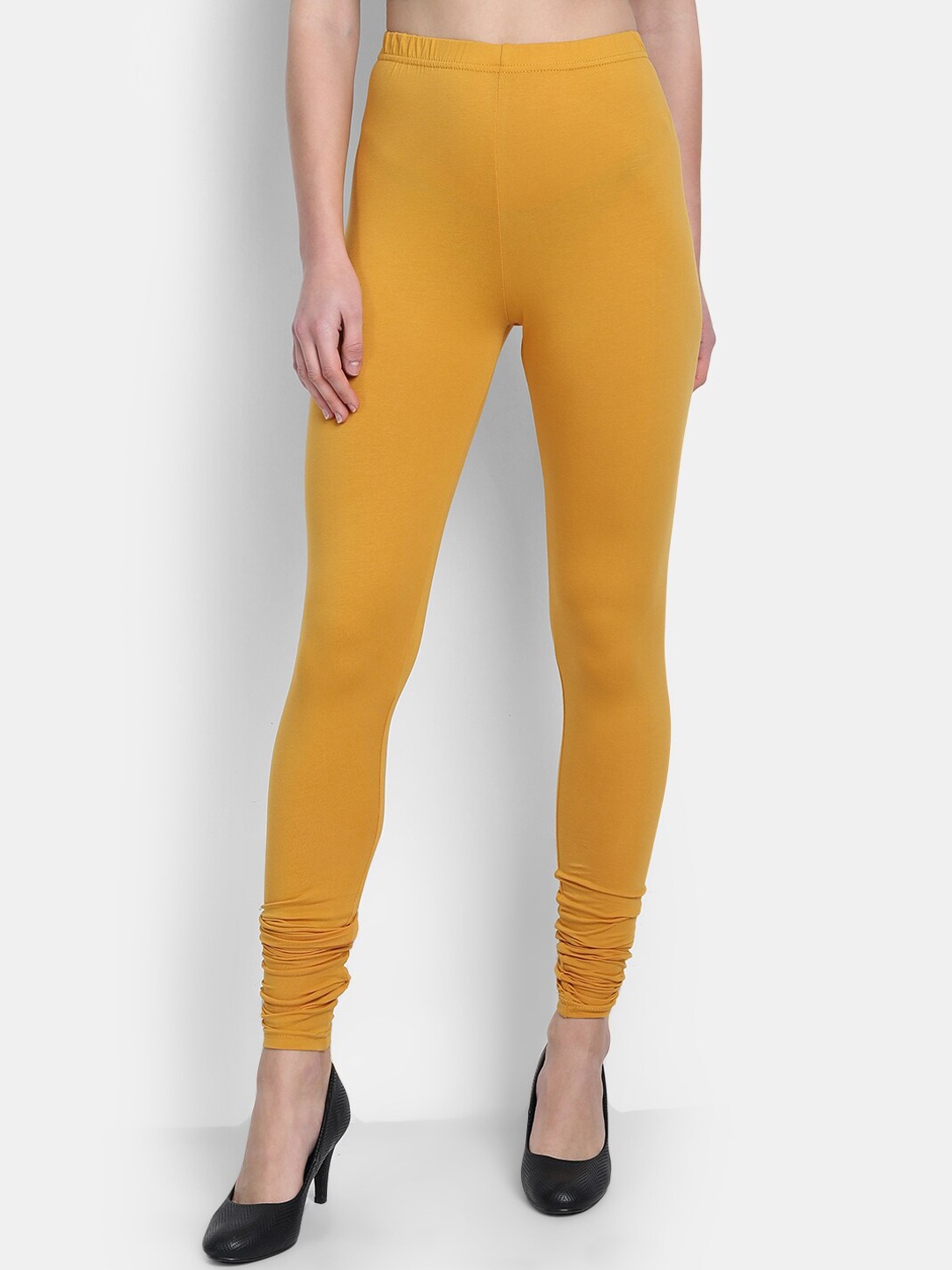 

fabGLOBAL Women Mustard Yellow Solid Churidar Length Leggings