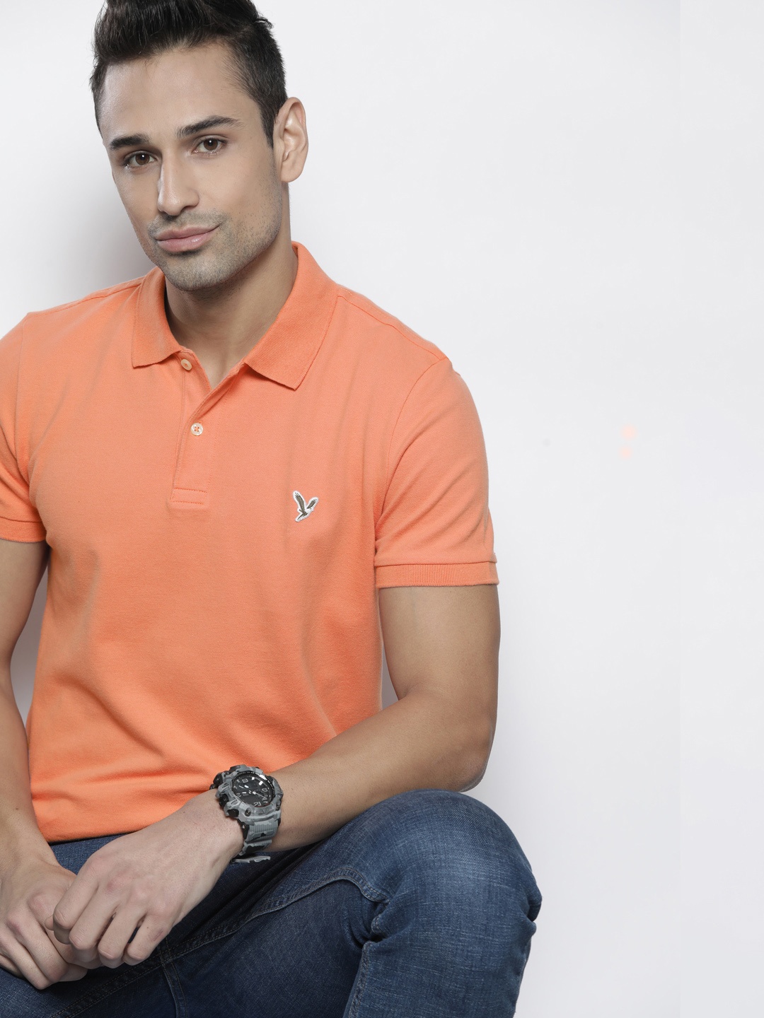 

AMERICAN EAGLE OUTFITTERS Men Peach-Coloured Solid Polo Collar T-shirt