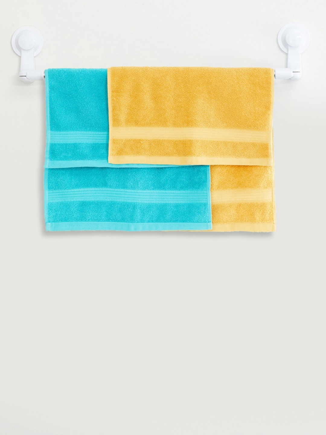 

Home Centre Set Of 2 Assorted Solid Cotton 110 GSM Bath Towels
