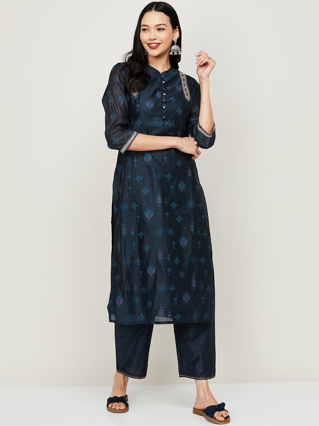 

Melange by Lifestyle Women Navy Blue Floral Printed Regular Kurta With Trousers