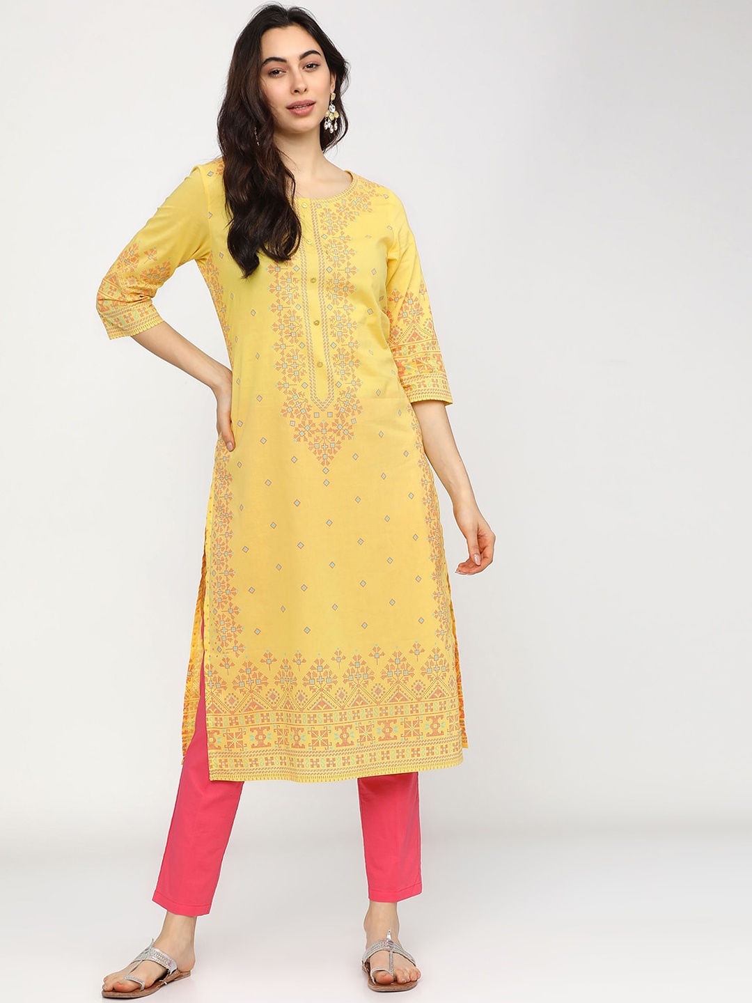 

Vishudh Women Yellow Printed Mirror Work Kurta