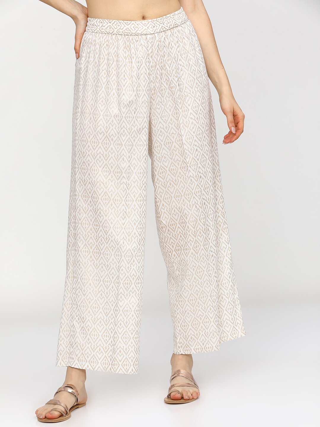 

Vishudh Women Off White & Brown Ethnic Motifs Printed Ethnic Palazzos