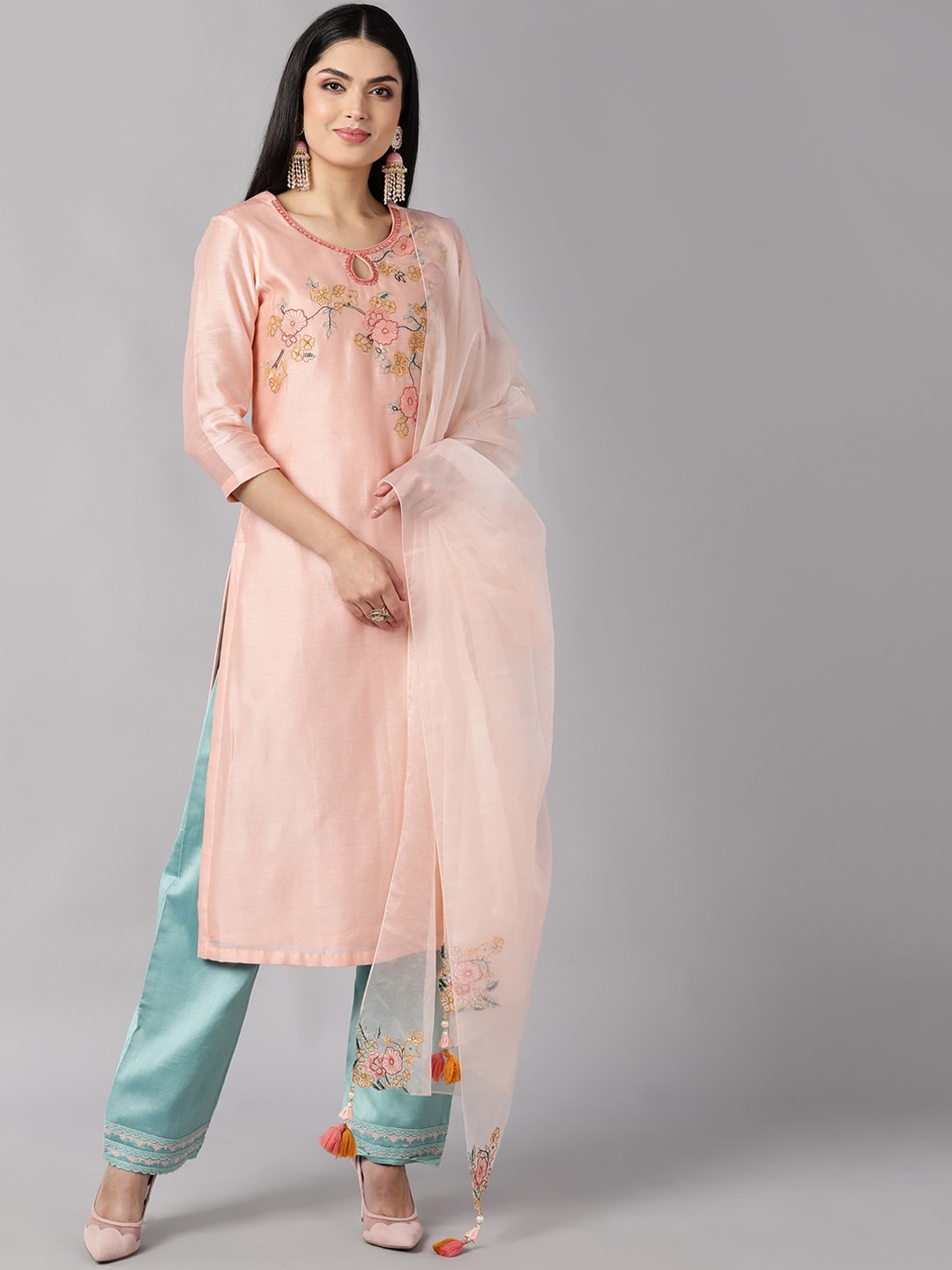 

AHIKA Women Peach Floral Embroidered Regular Kurti with Trousers & Dupatta