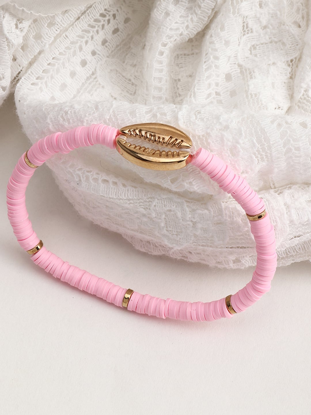 

URBANIC Women Pink & Gold-Toned Cowry Detail Elasticated Bracelet