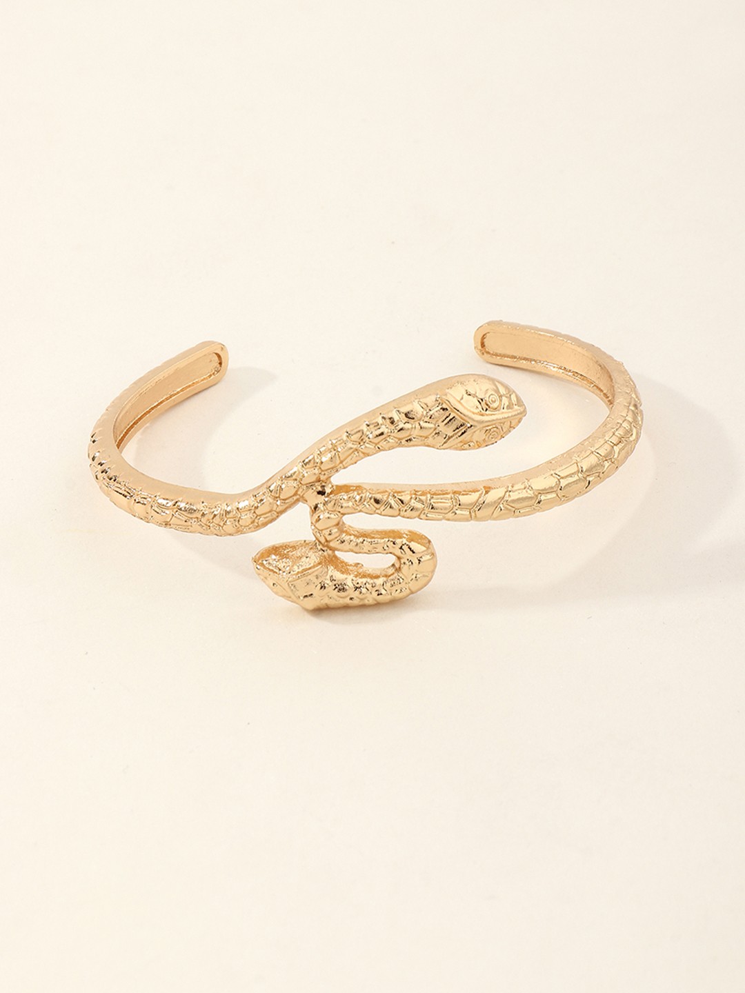 

URBANIC Women Gold-Toned Animal Design Cuff Bracelet