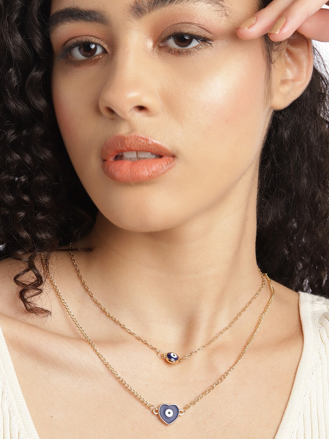 

DressBerry Gold-Toned & Navy Heart Shaped Enamelled Evil Eye Layered Necklace