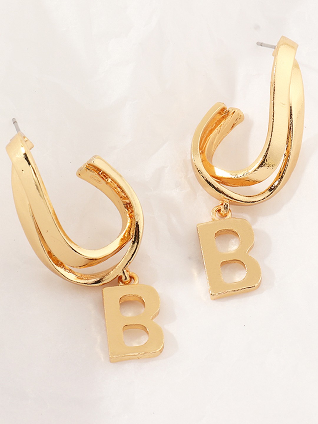 

URBANIC Gold-Toned Oval Alphabet Design Drop Earrings