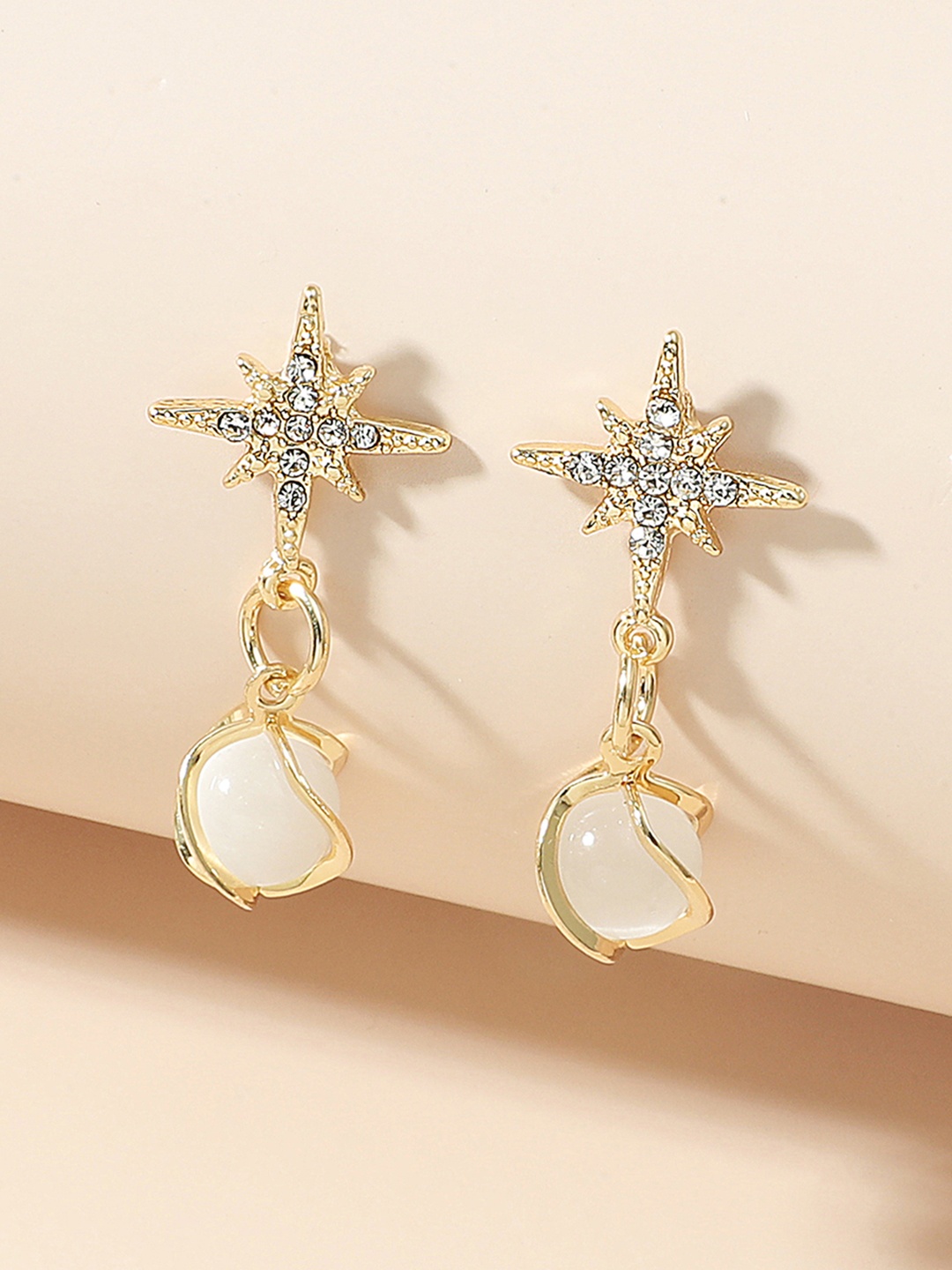 

URBANIC Gold-Toned Star Shaped Drop Earrings