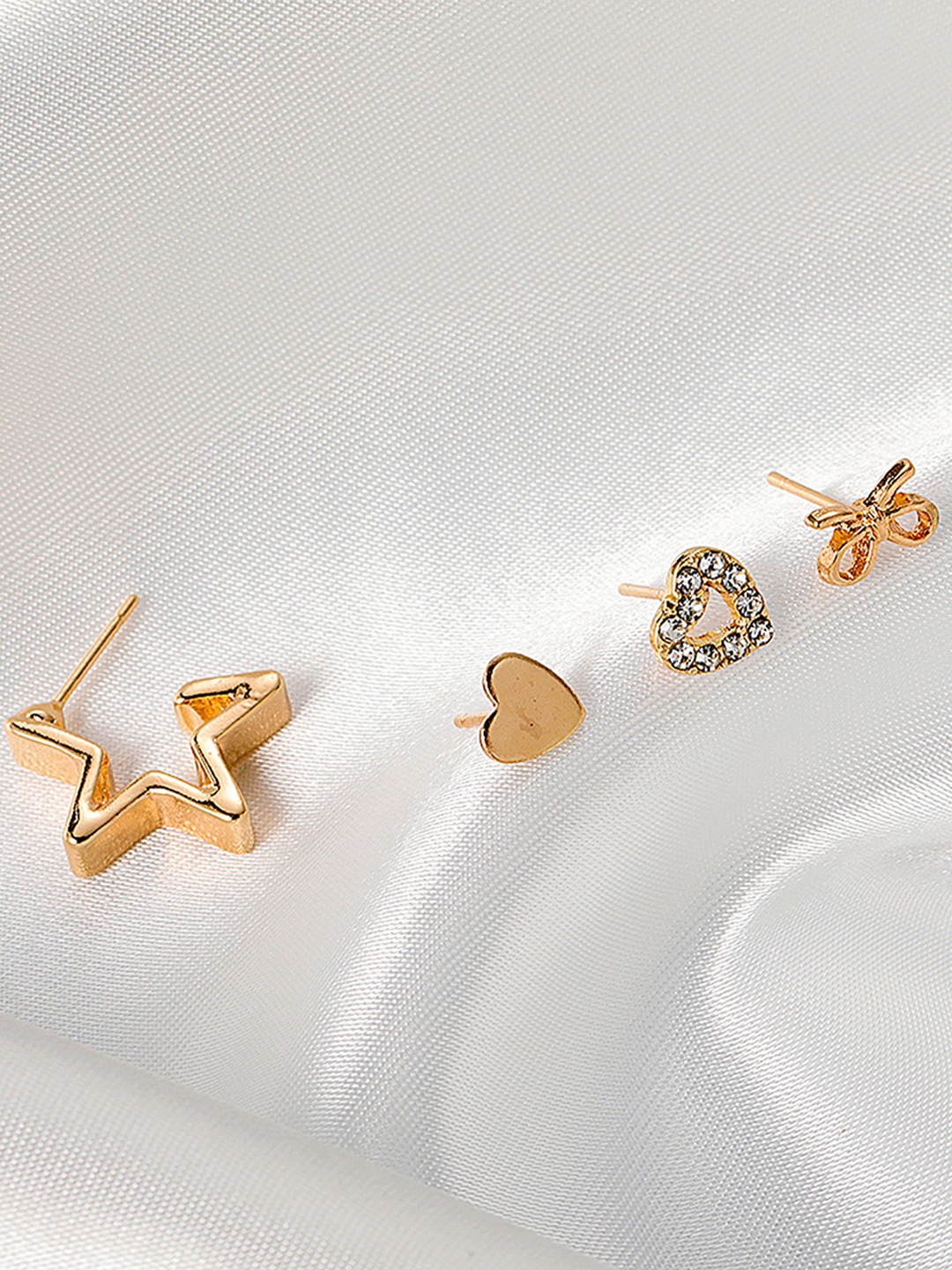 

URBANIC Women Pack of 4 Gold-Toned Star Shaped Studs Earrings