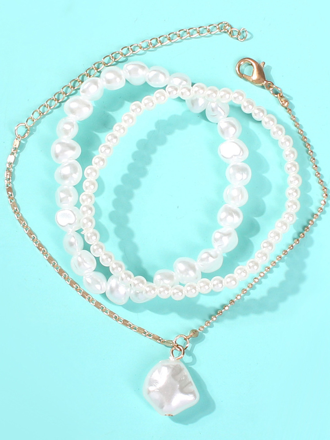 

URBANIC Women Set of 3 Gold-Toned & White Pearl Imitation Anklet