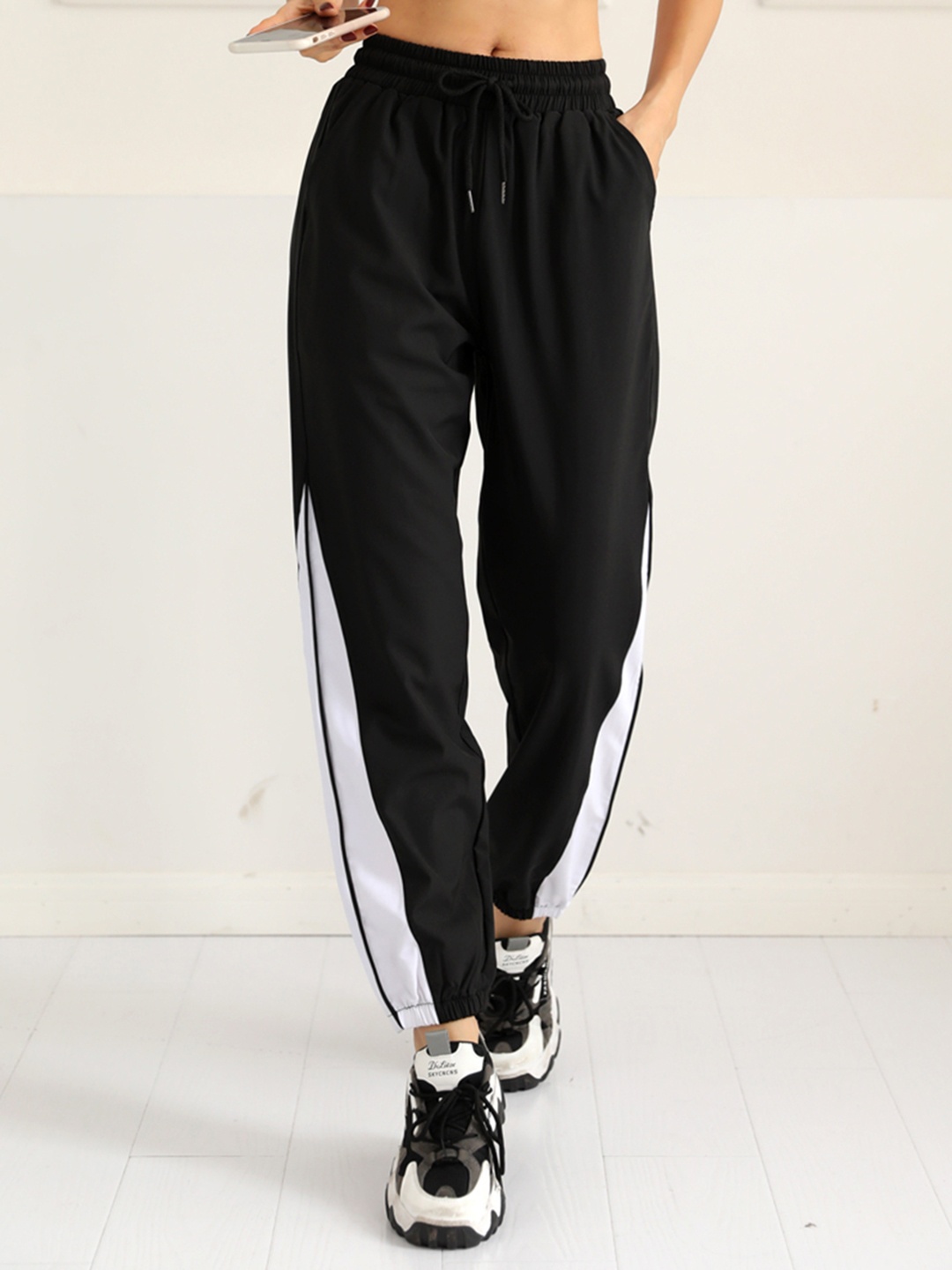 

URBANIC Women Black Solid Sports Joggers