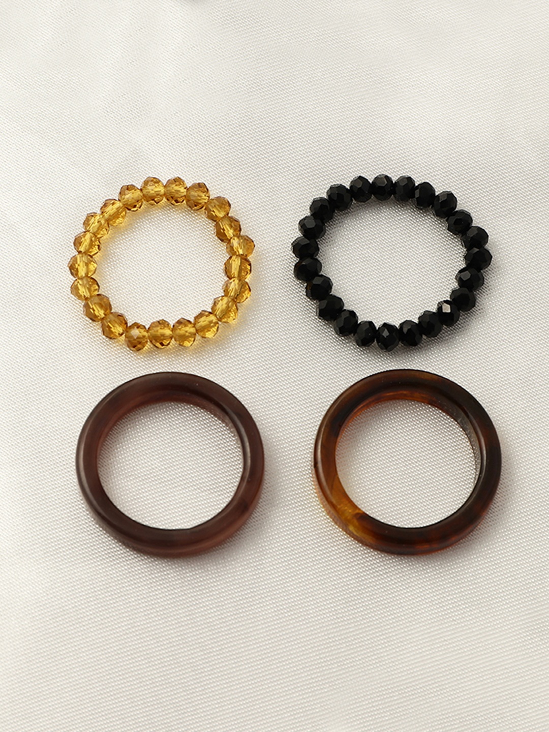 

URBANIC Women Set of 4 Brown Geometric Imitation Ring