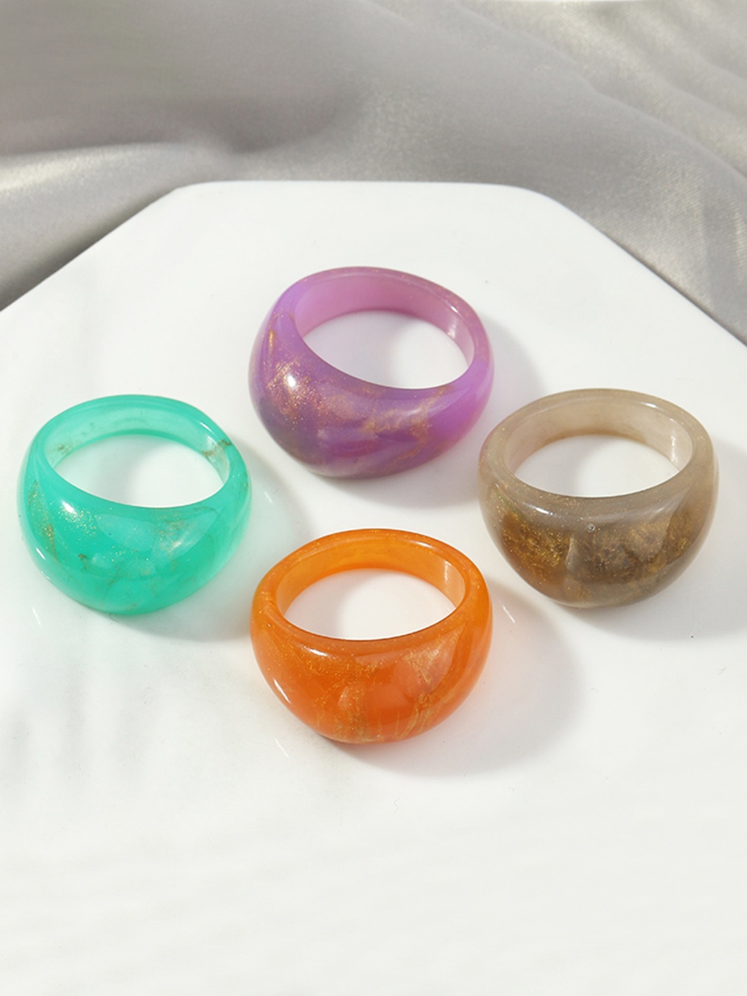 

URBANIC Women Set of 4 Finger Rings, Orange
