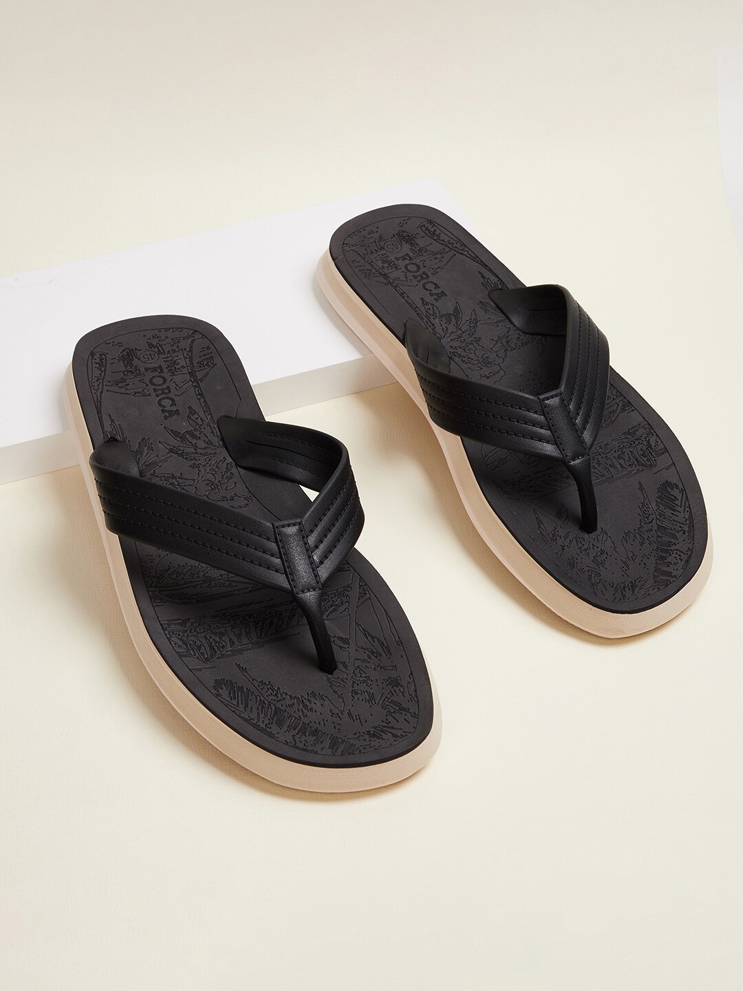 

Forca by Lifestyle Men Black & Off White Printed Thong Flip-Flops