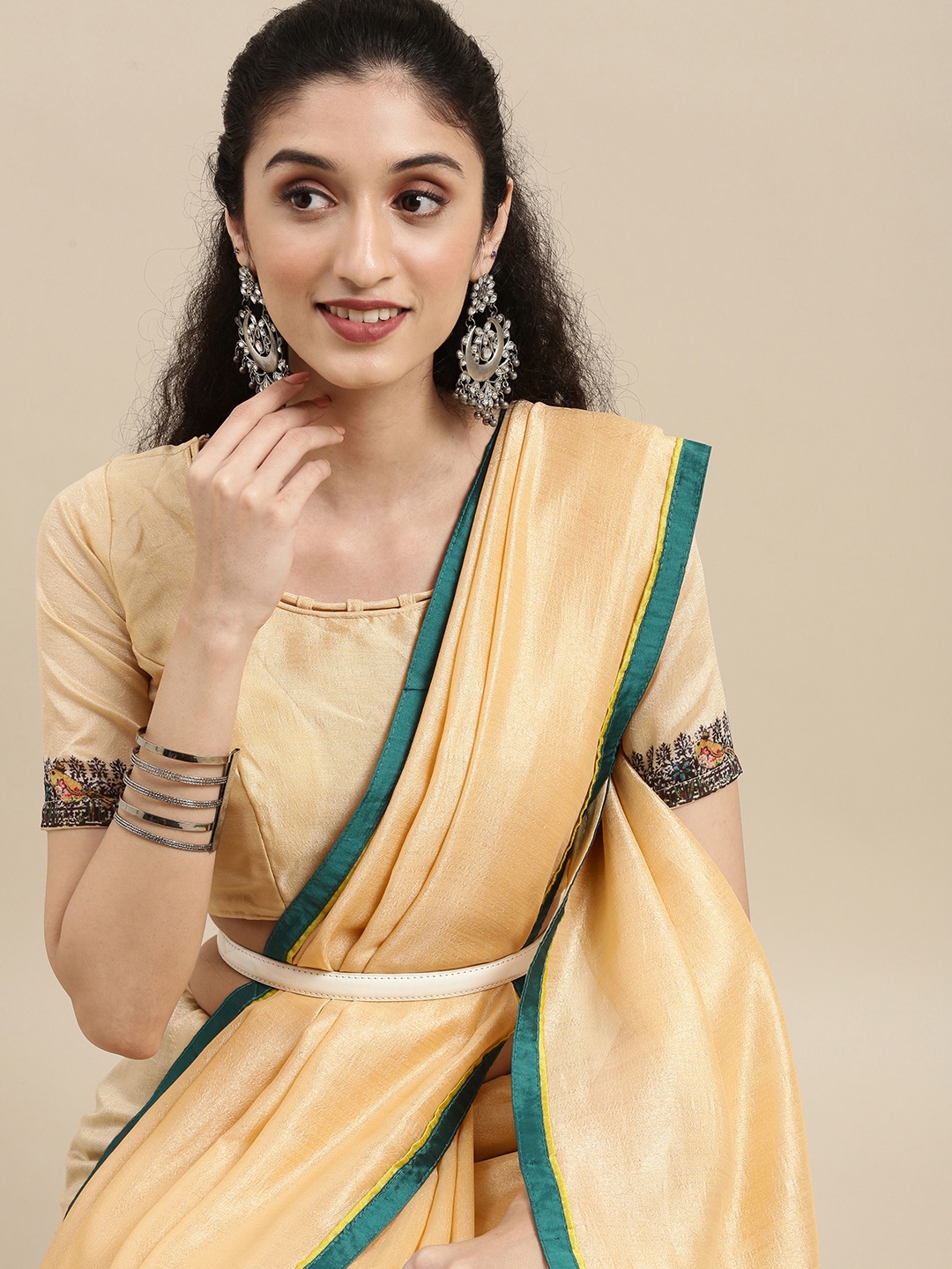 

Mitera Beige Pure Georgette Saree