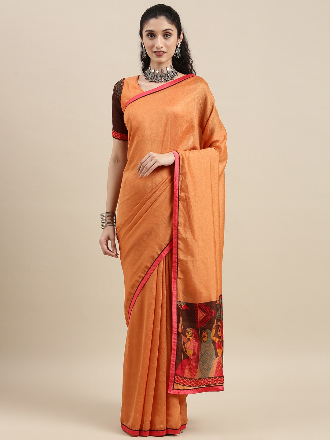 

Mitera Orange Pure Georgette Saree