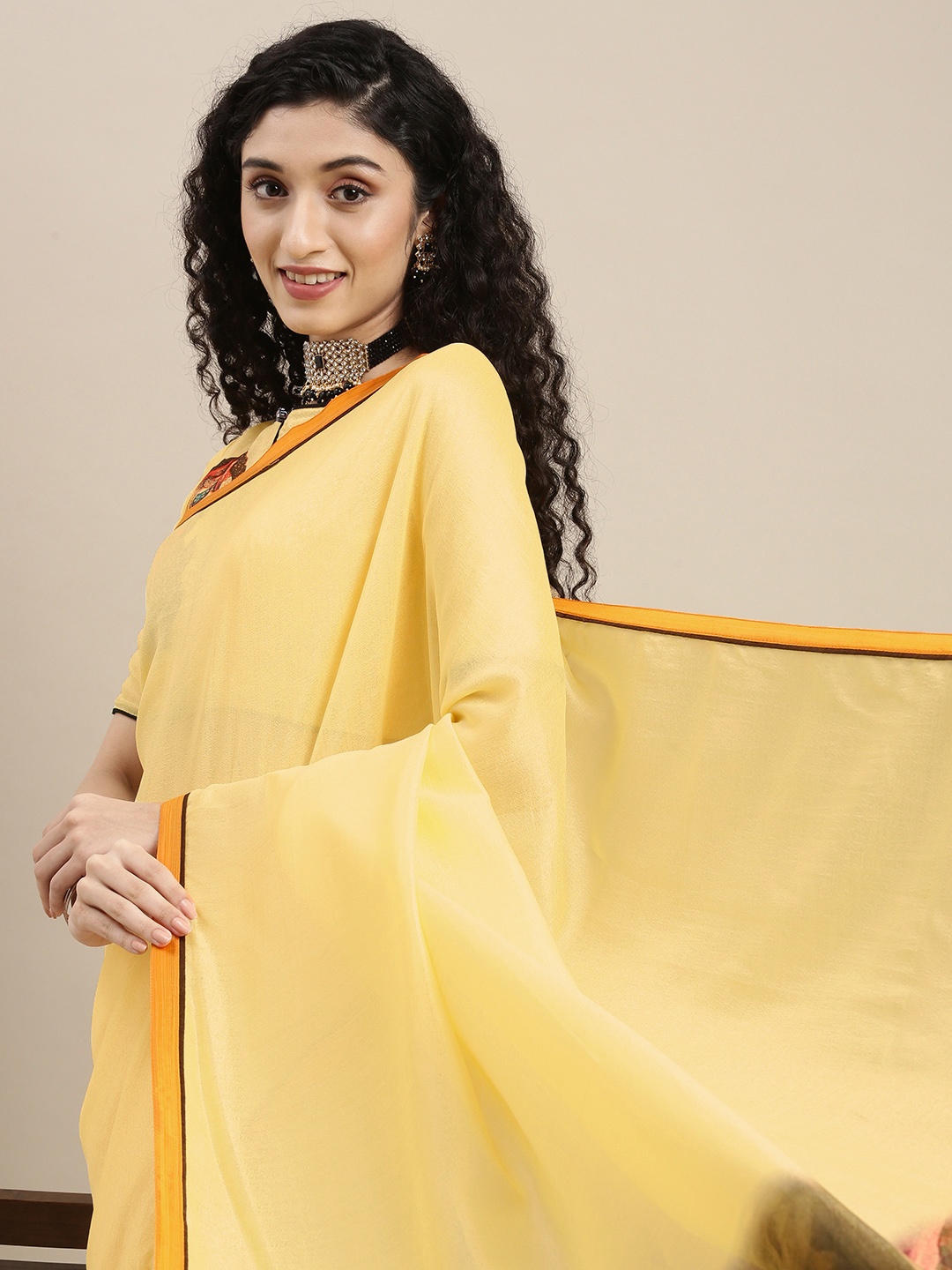 

Mitera Yellow Pure Georgette Saree