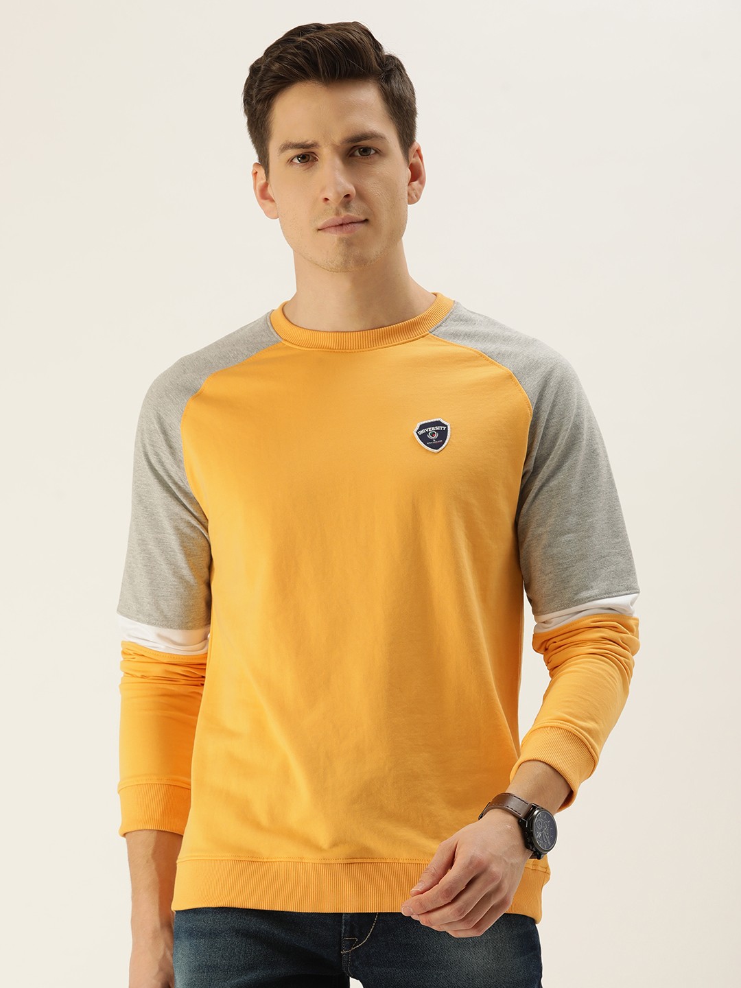 

PETER ENGLAND UNIVERSITY Men Mustard Yellow Solid Sweatshirt with Contrast Sleeves