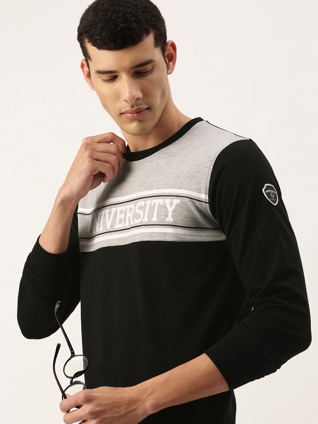 

PETER ENGLAND UNIVERSITY Men Black Colourblocked Round Neck Sweatshirt