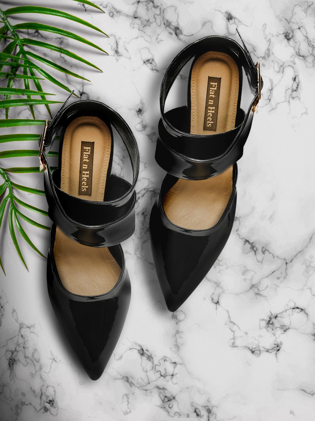 

Flat n Heels Woman Black Pumps