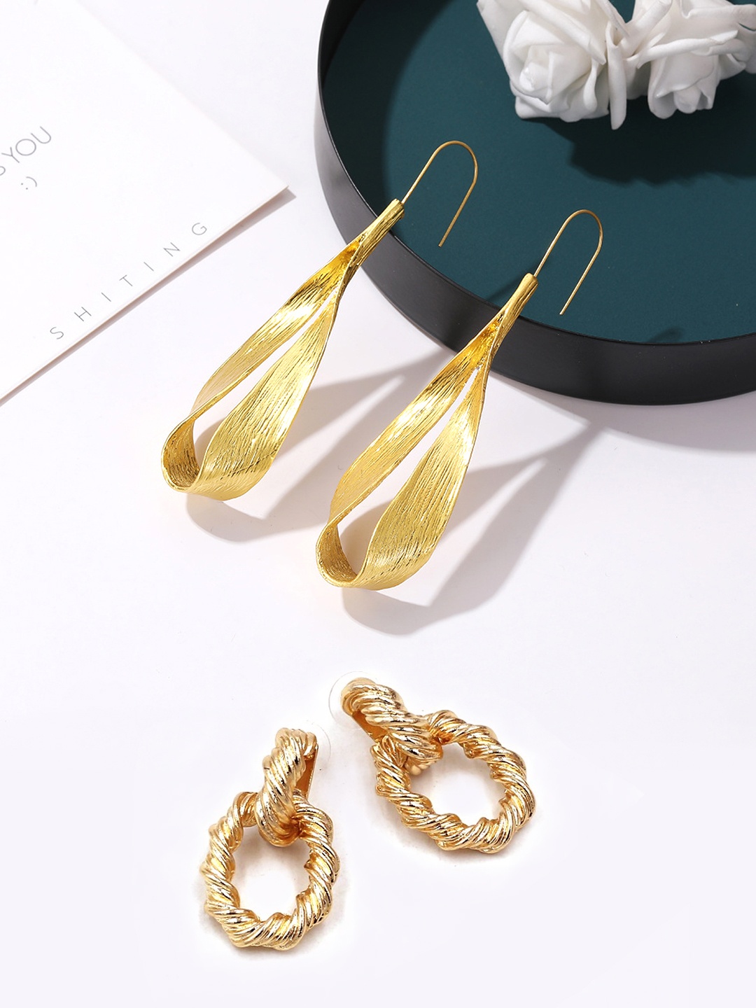 

Yellow Chimes Gold-Toned Alloy Gold Plated Leaf Shaped Drop Earrings