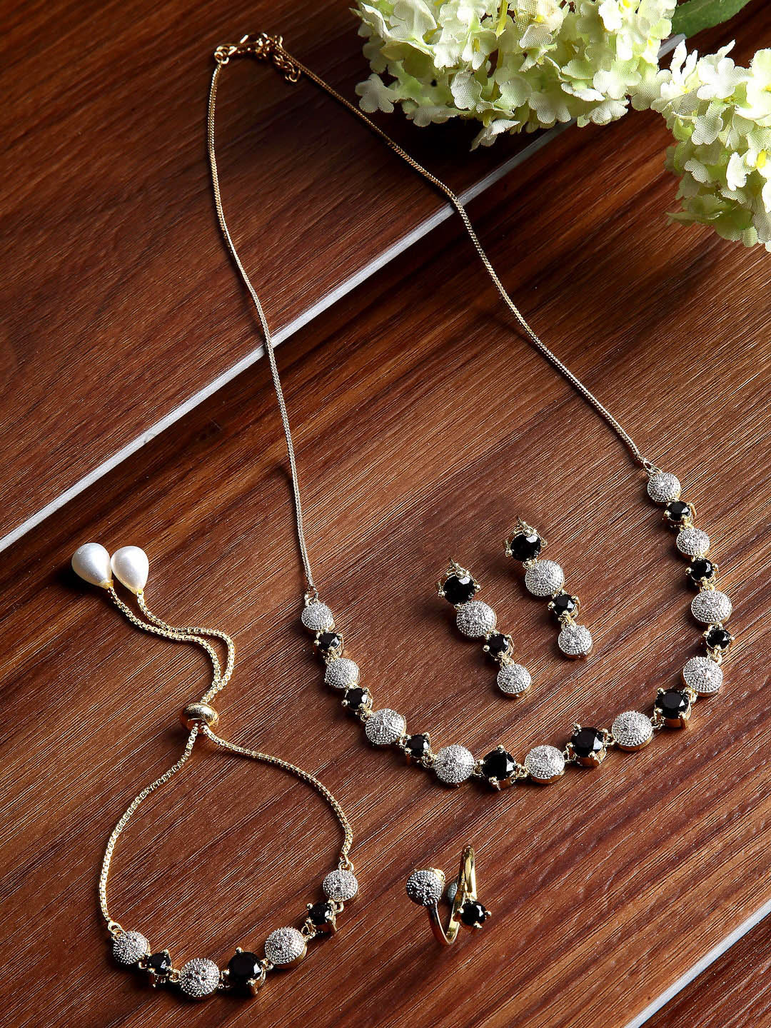 

ZENEME Black & White Gold Plated Stone American Diamond Studded Jewellery Set