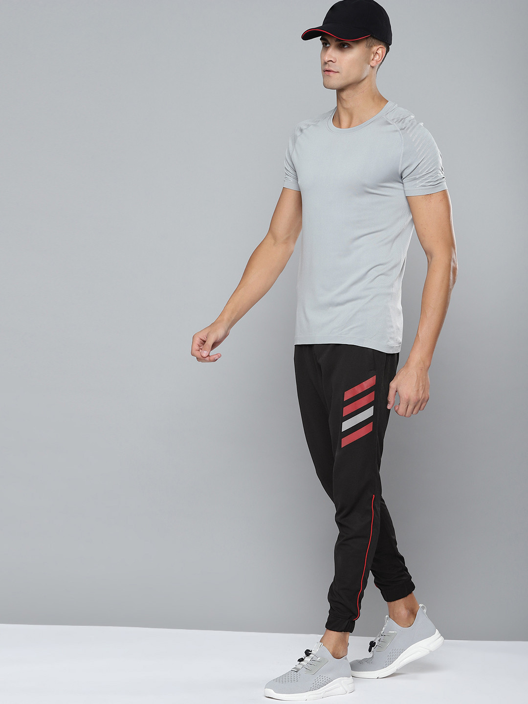 

Slazenger Men Black Striped Detail Running Joggers with Reflective Print
