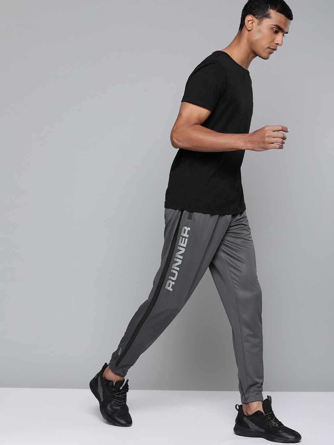 

Slazenger Men Charcoal Grey Solid Running Joggers with Reflective Detail