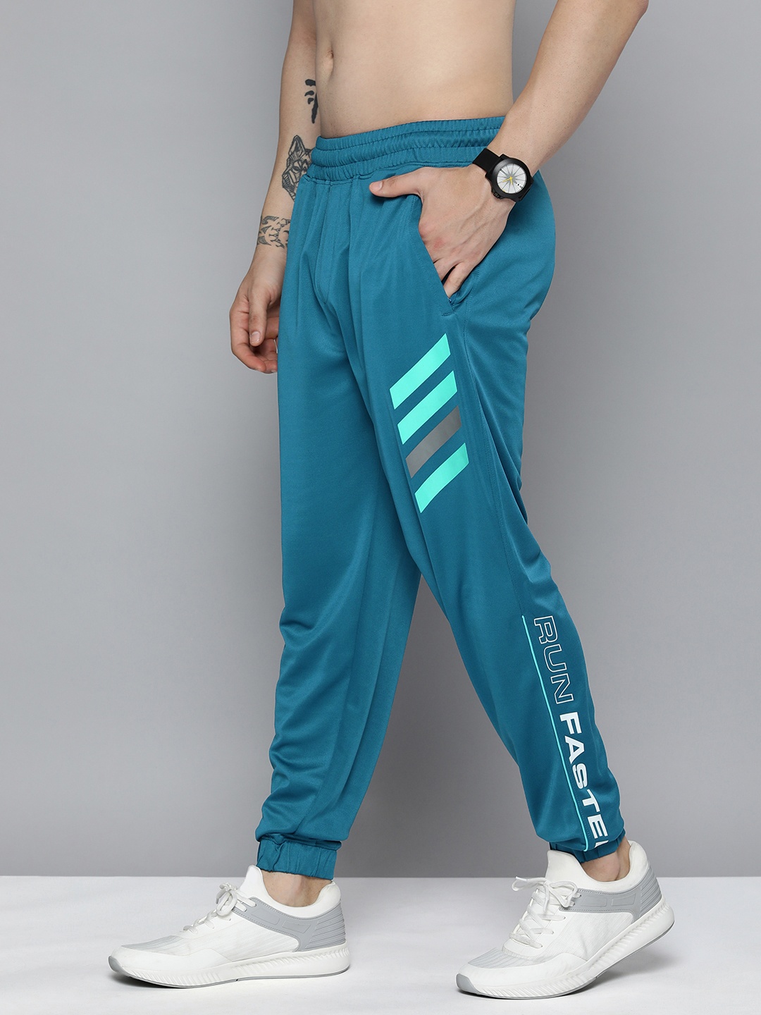 

Slazenger Men Teal Blue Typography Printed Running Joggers