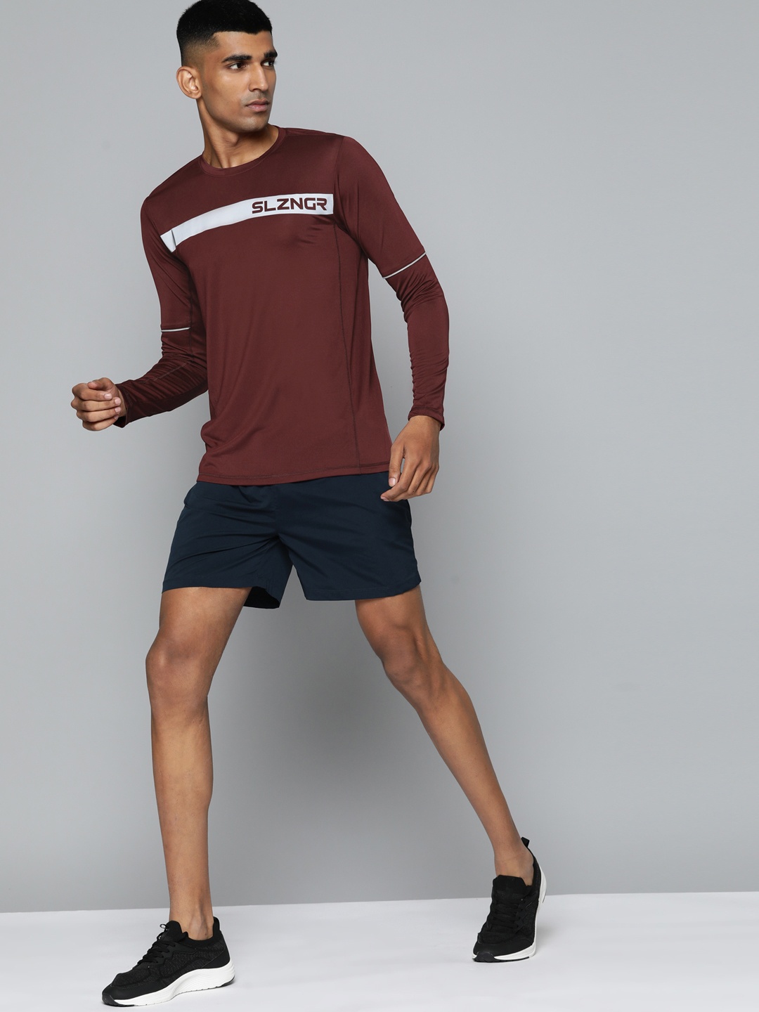 

Slazenger Men Maroon Brand Logo Printed Antimicrobial T-shirt