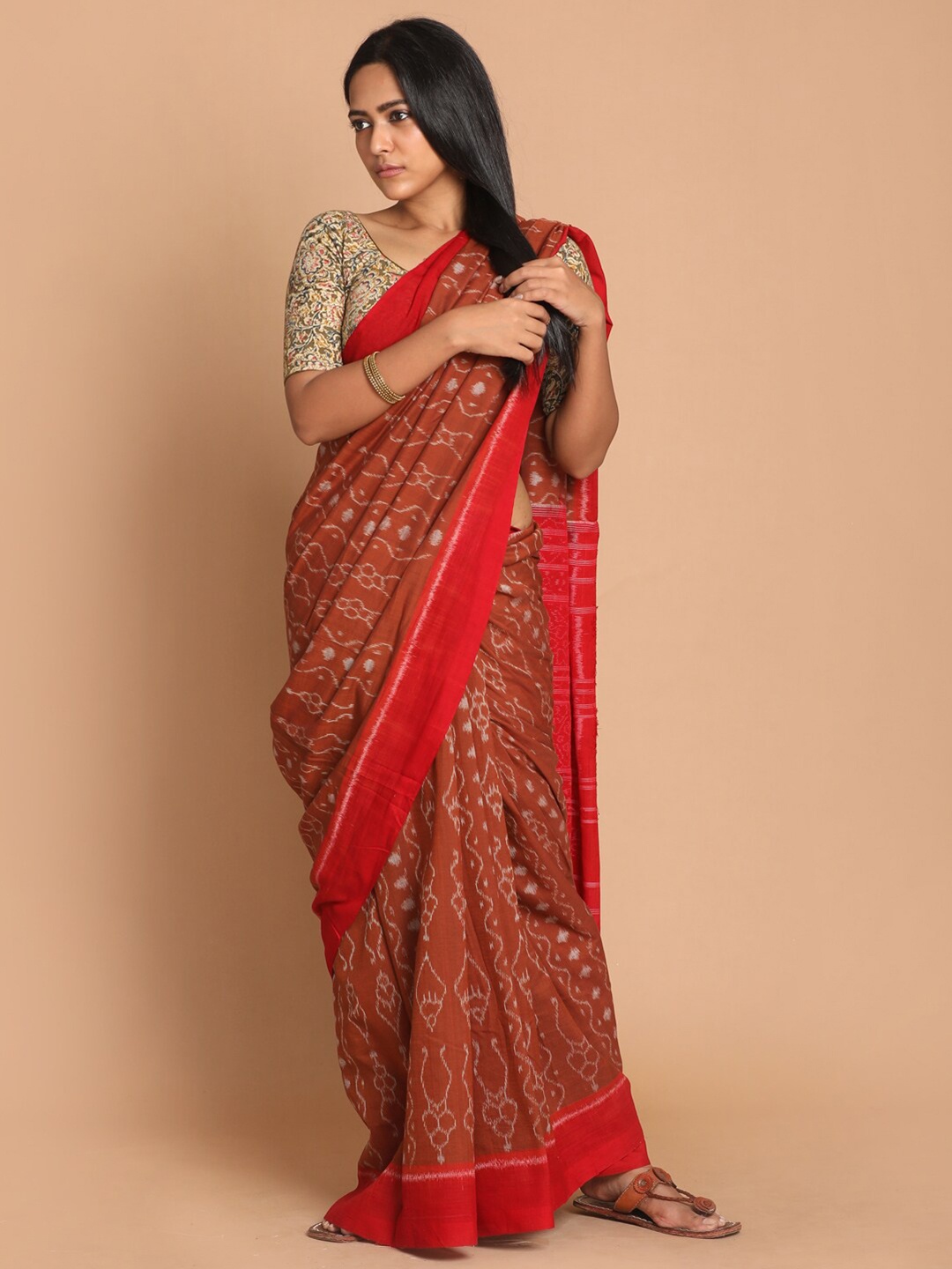 

Indethnic Coffee Brown & Red Ethnic Motifs Pure Cotton Sambalpuri Saree