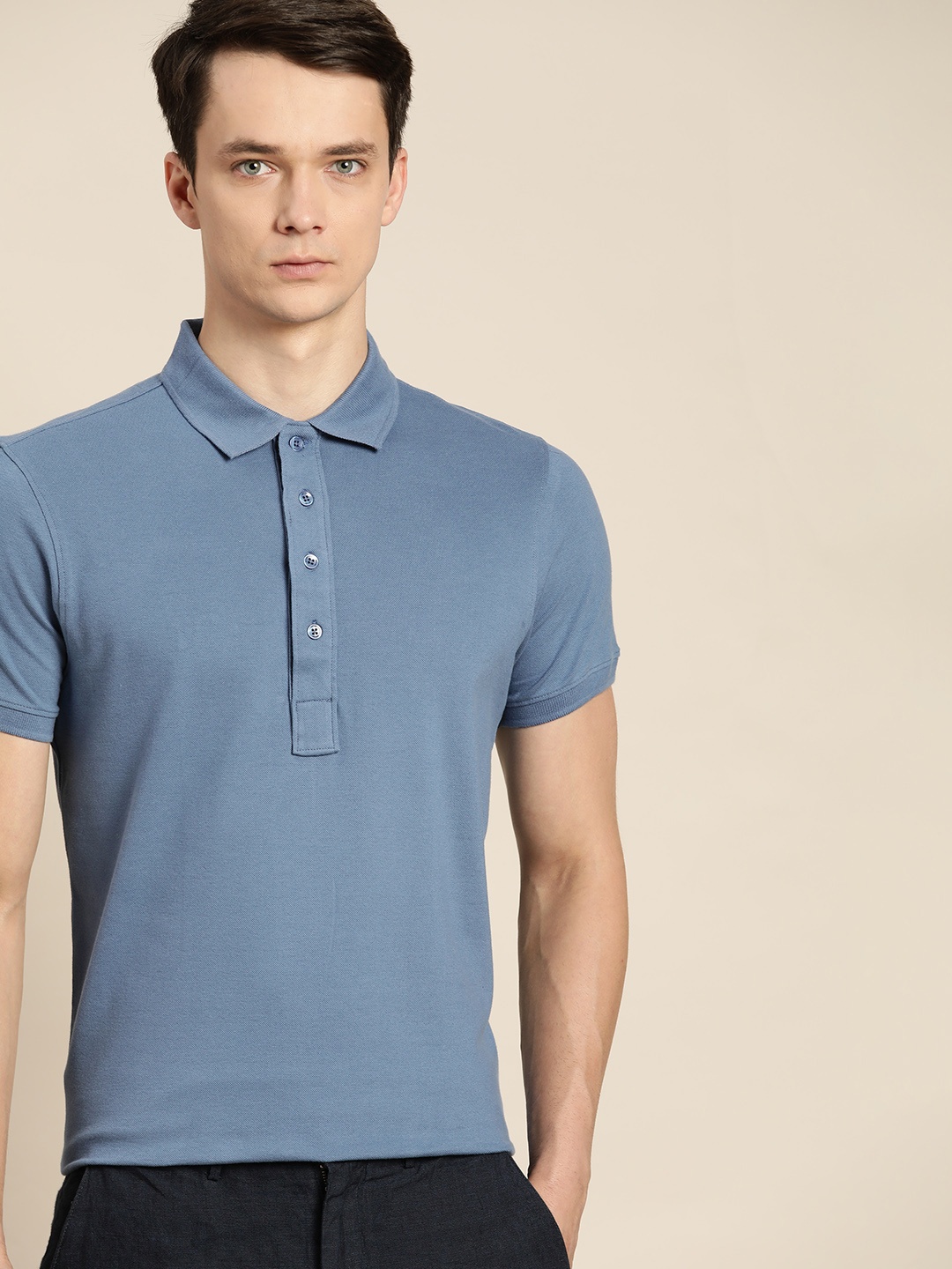 

ether Men Blue Solid Polo Collar T-shirt