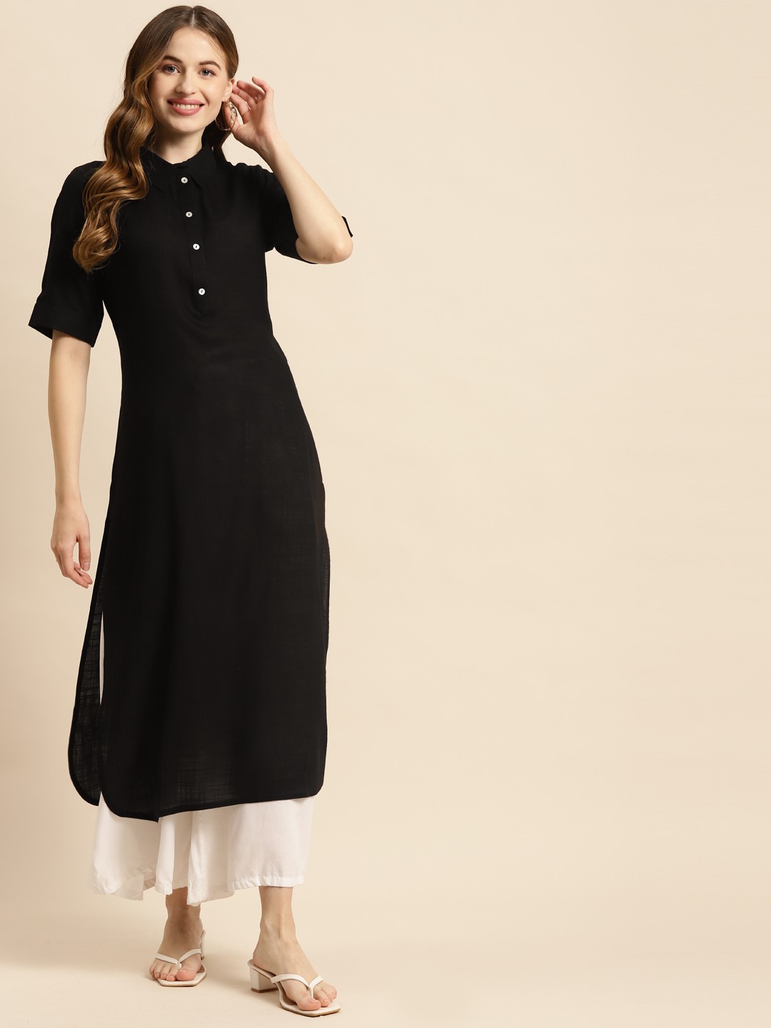 

Prakrti Women Black Solid Shirt Collar Kurta
