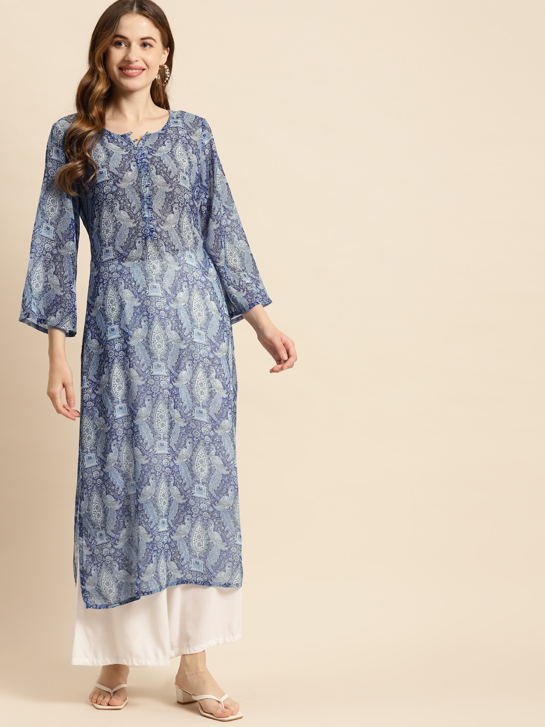 

Prakrti Women Blue Ethnic Motifs Printed Georgette Straight Kurta