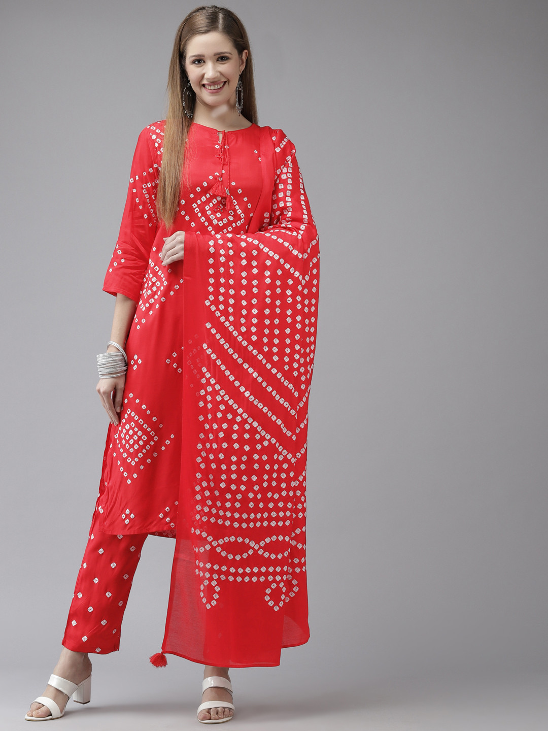 

Ishin Women Red Bandhani Printed Regular Art Silk Kurta with Trousers & With Dupatta