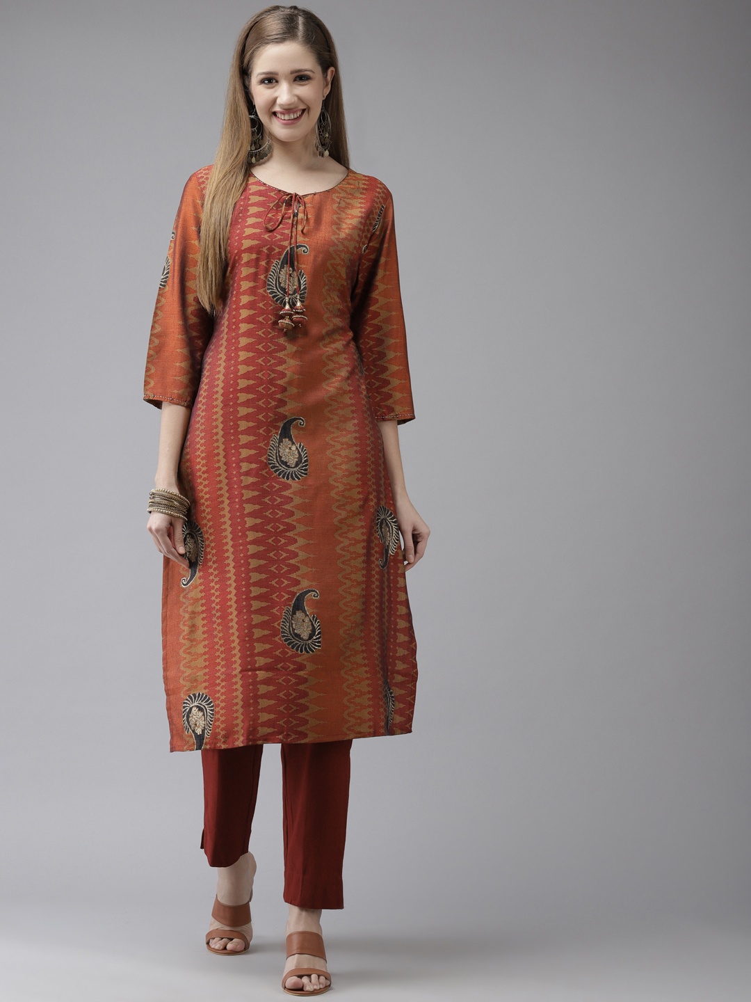

Ishin Women Maroon & Rust Abstract Printed Beads and Stones Kurta with Trousers
