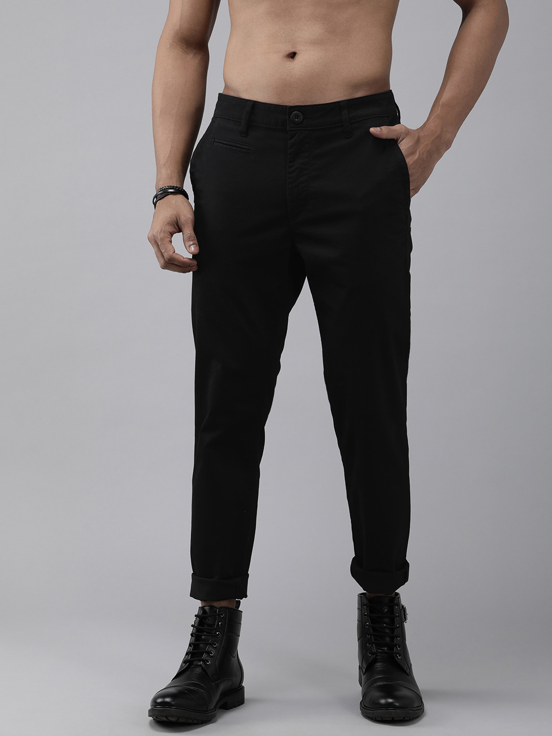 

The Roadster Lifestyle Co Men Black Solid Mid Rise Regular Trousers