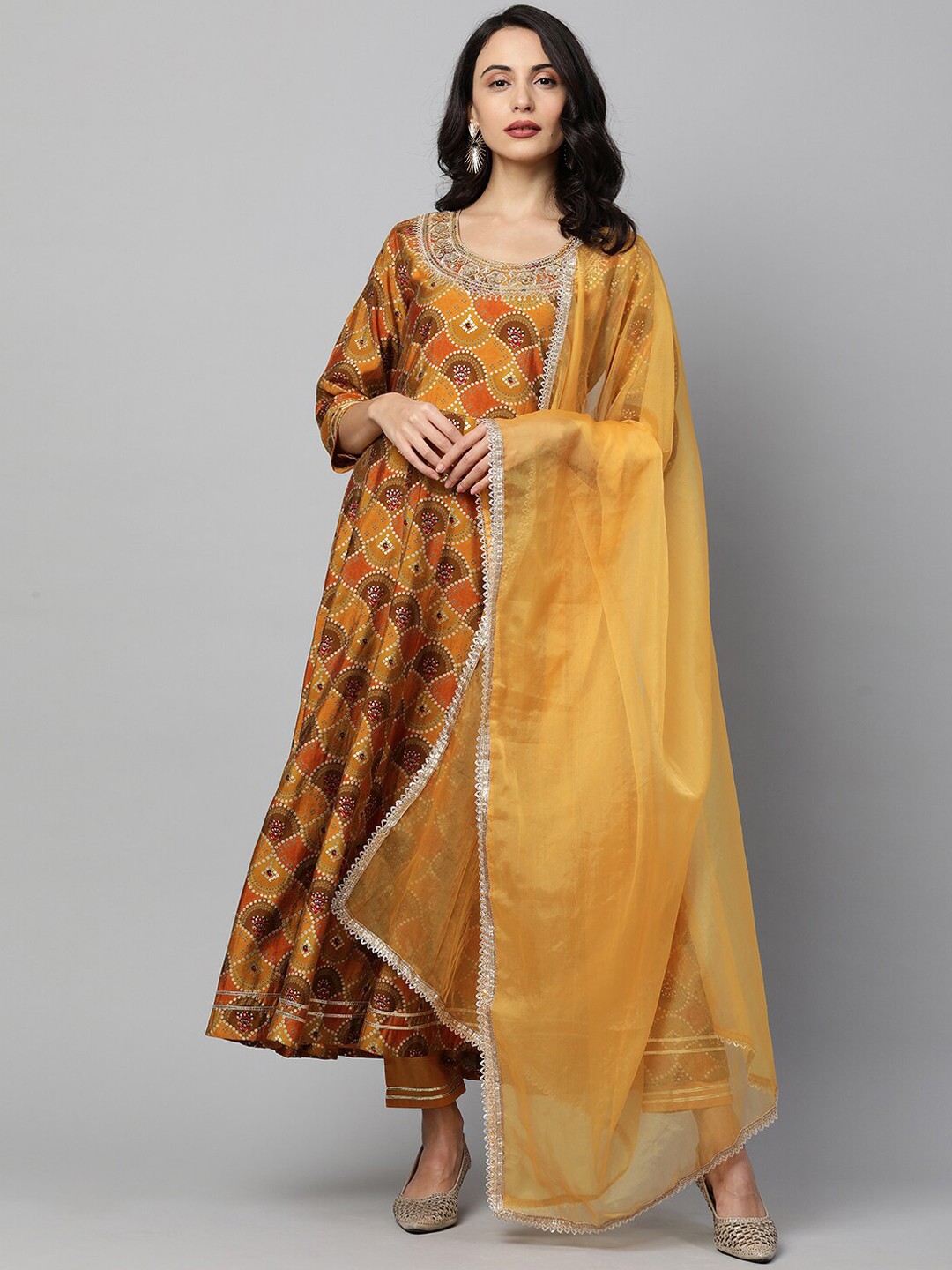 

FASHOR Women Mustard Yellow Bandhani Embroidered Regular Kurta with Trousers & With Dupatta