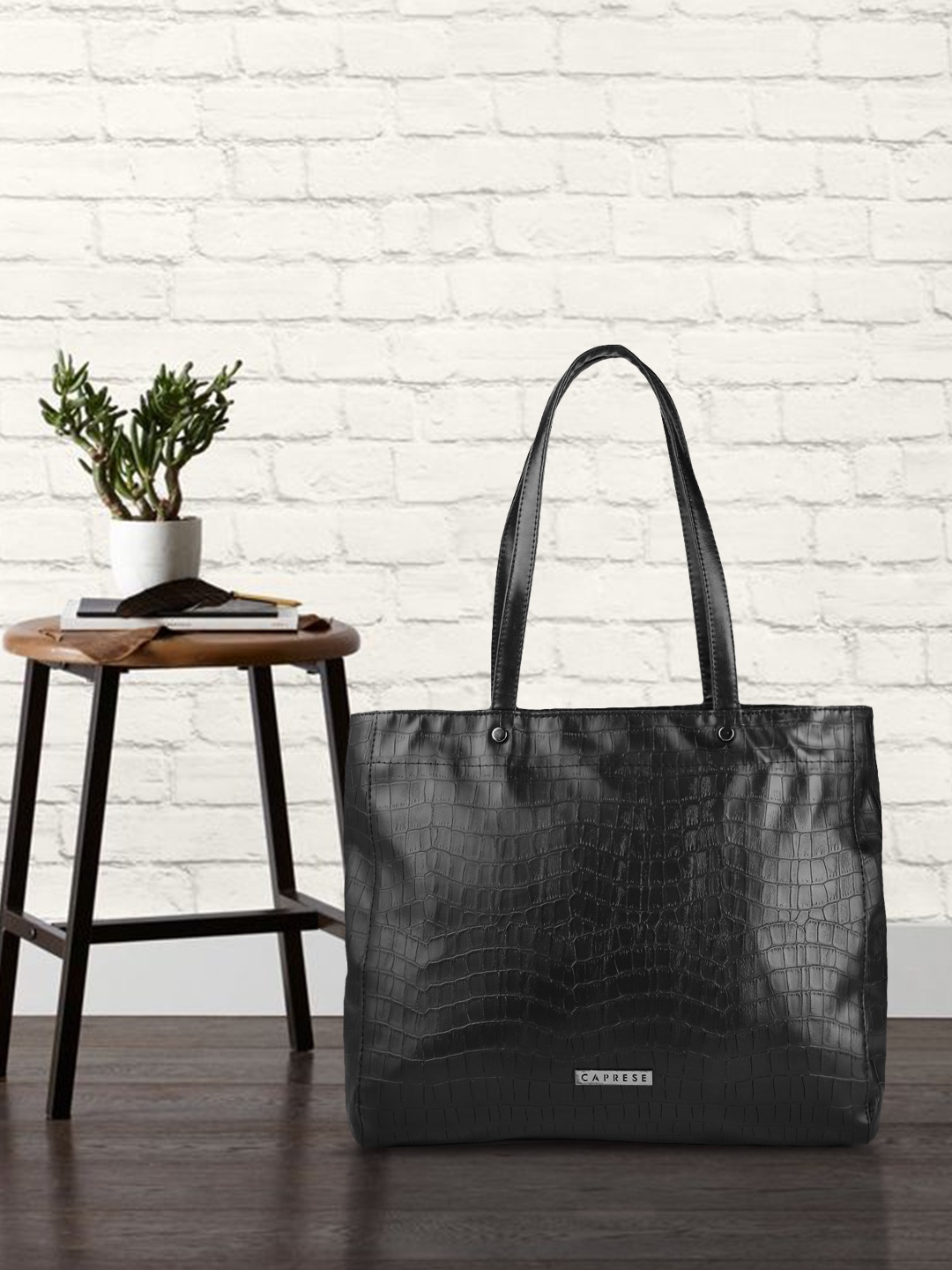 

Caprese Black Animal Textured PU Structured Shoulder Bag