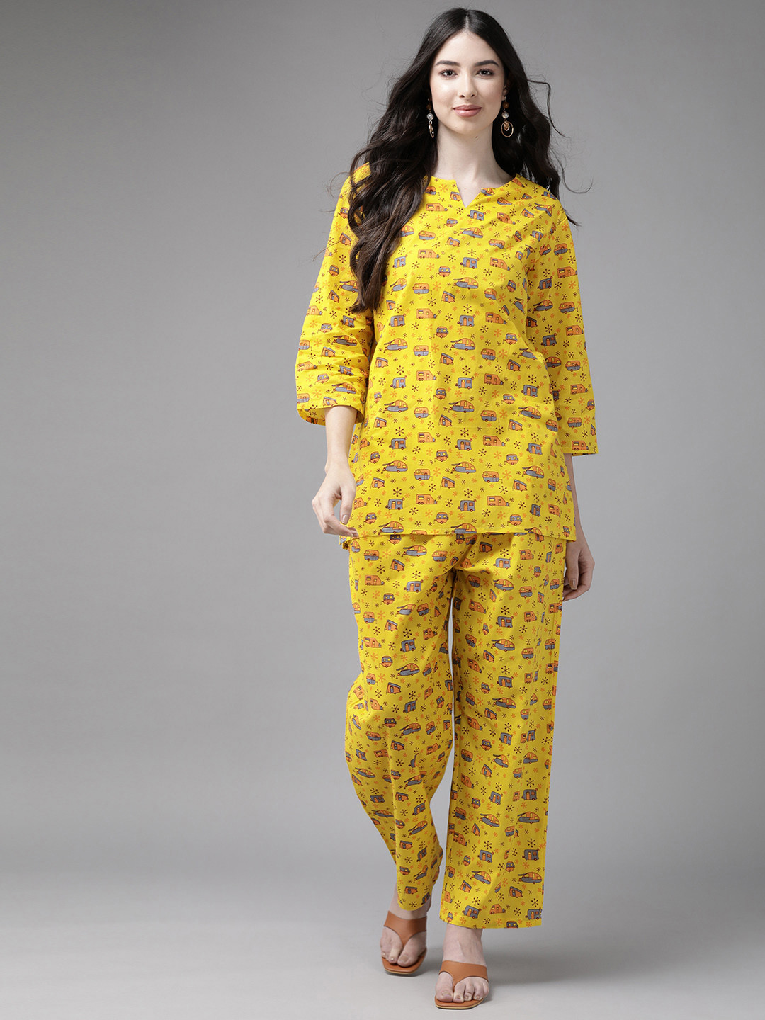 

Indo Era Women Yellow Printed Regular Kurta with Trousers