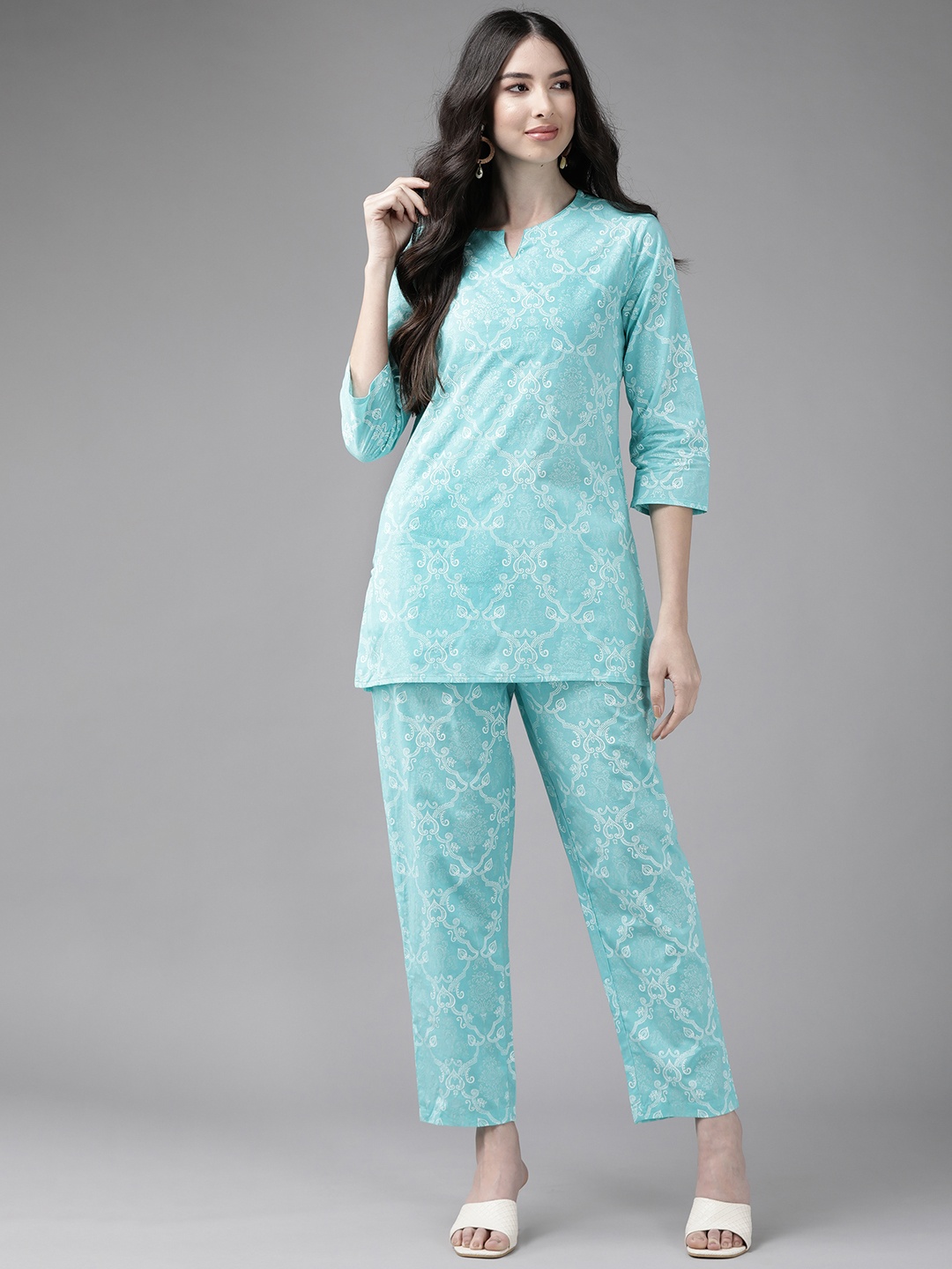 

Indo Era Women Blue Printed Regular Kurta with Trousers