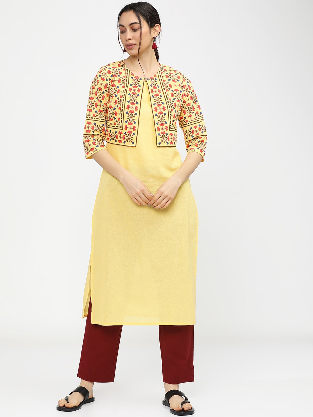 

Vishudh Women Yellow Geometric Yoke Design Mirror Work Kurta