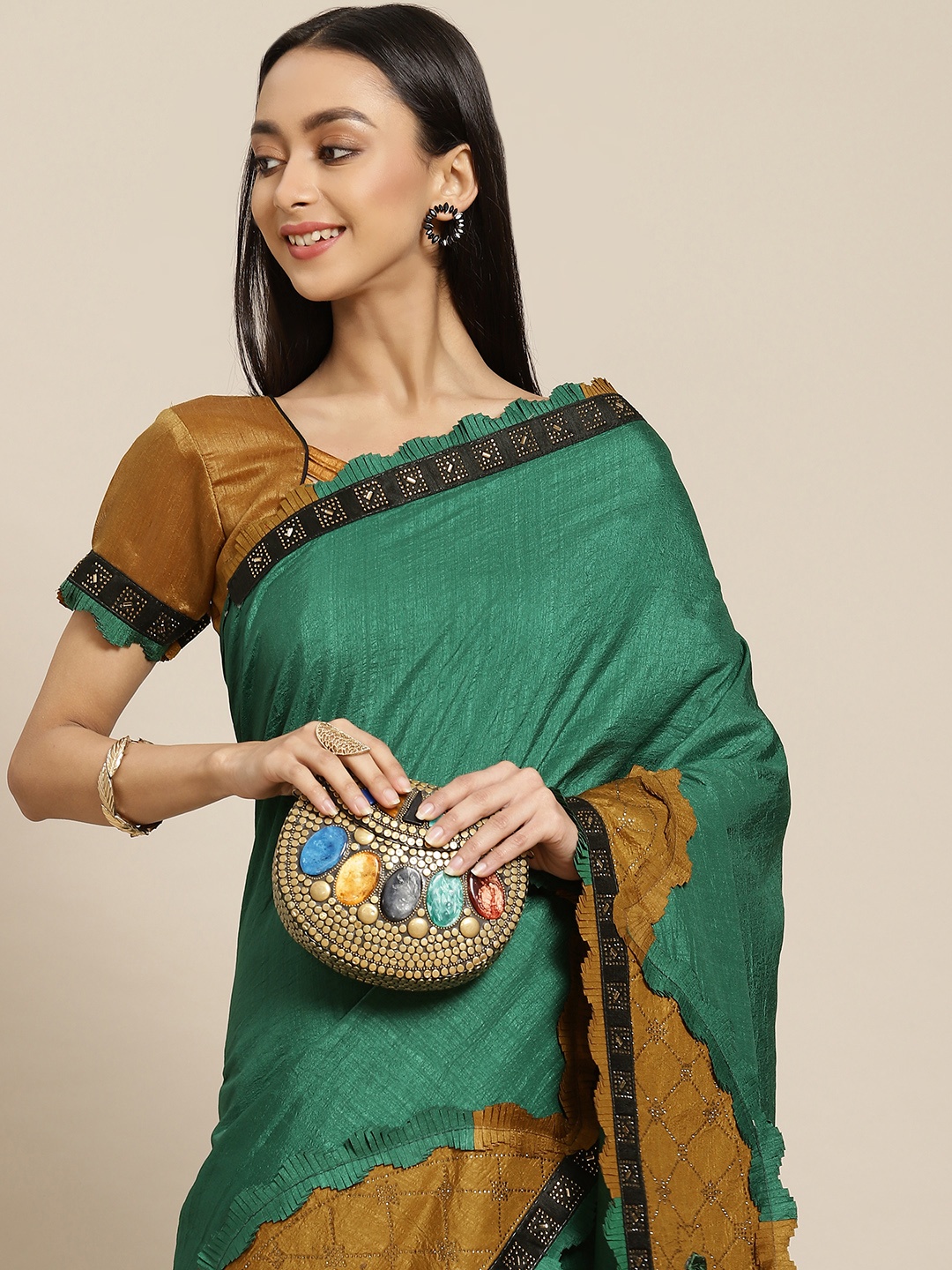 

Mitera Green Mukaish Saree