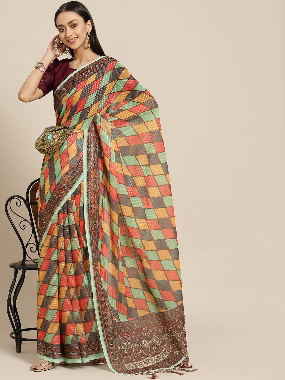 

Mitera Green & Orange Printed Saree